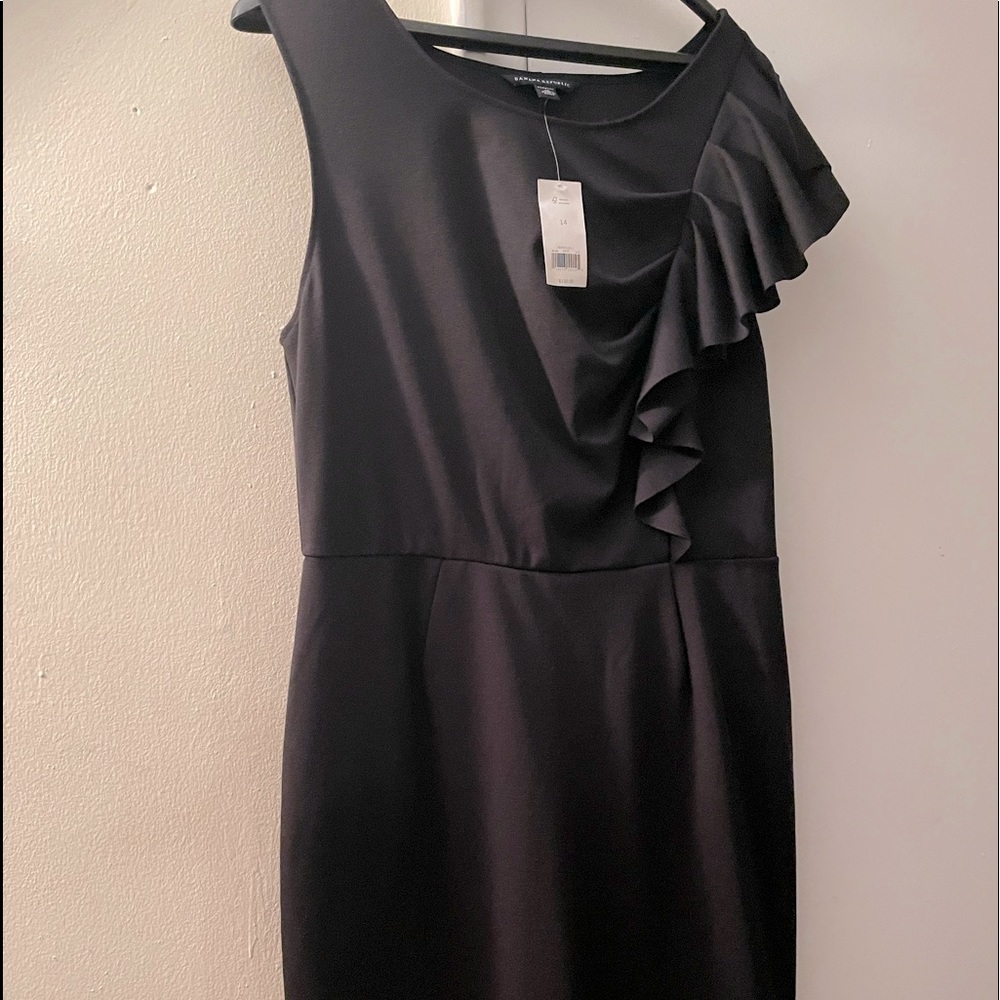 Cute LBD from Banana Republic, Black with ruffles on on side of bust. Size 14